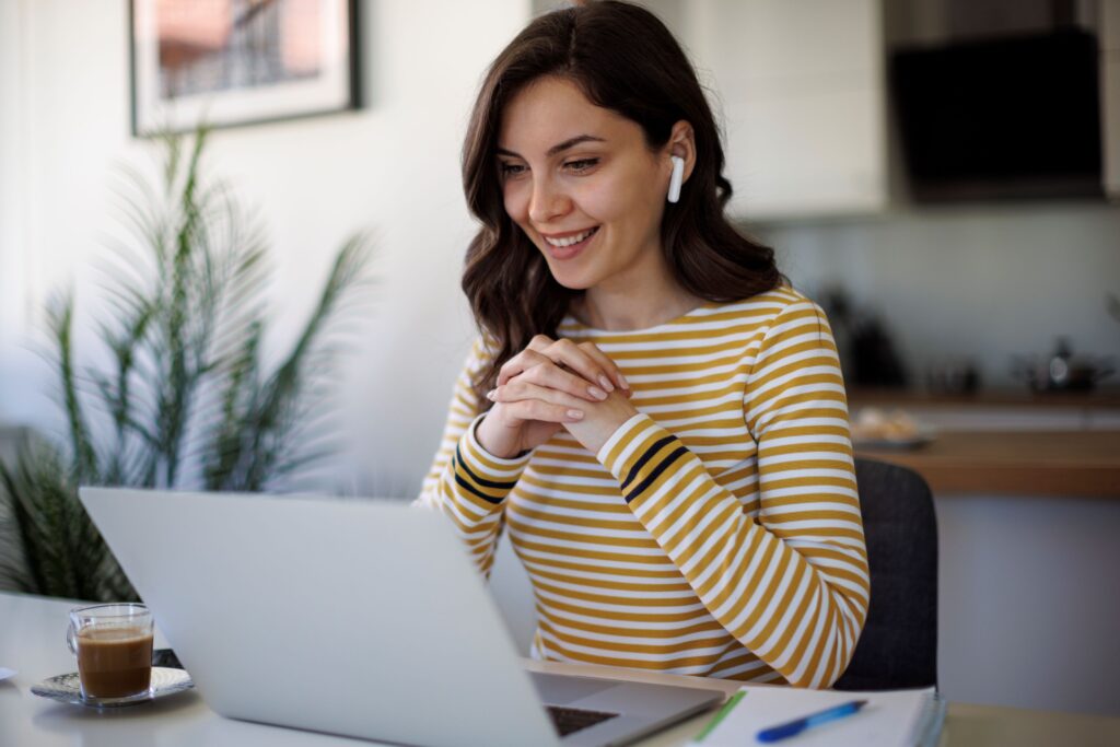 woman watching a webinar